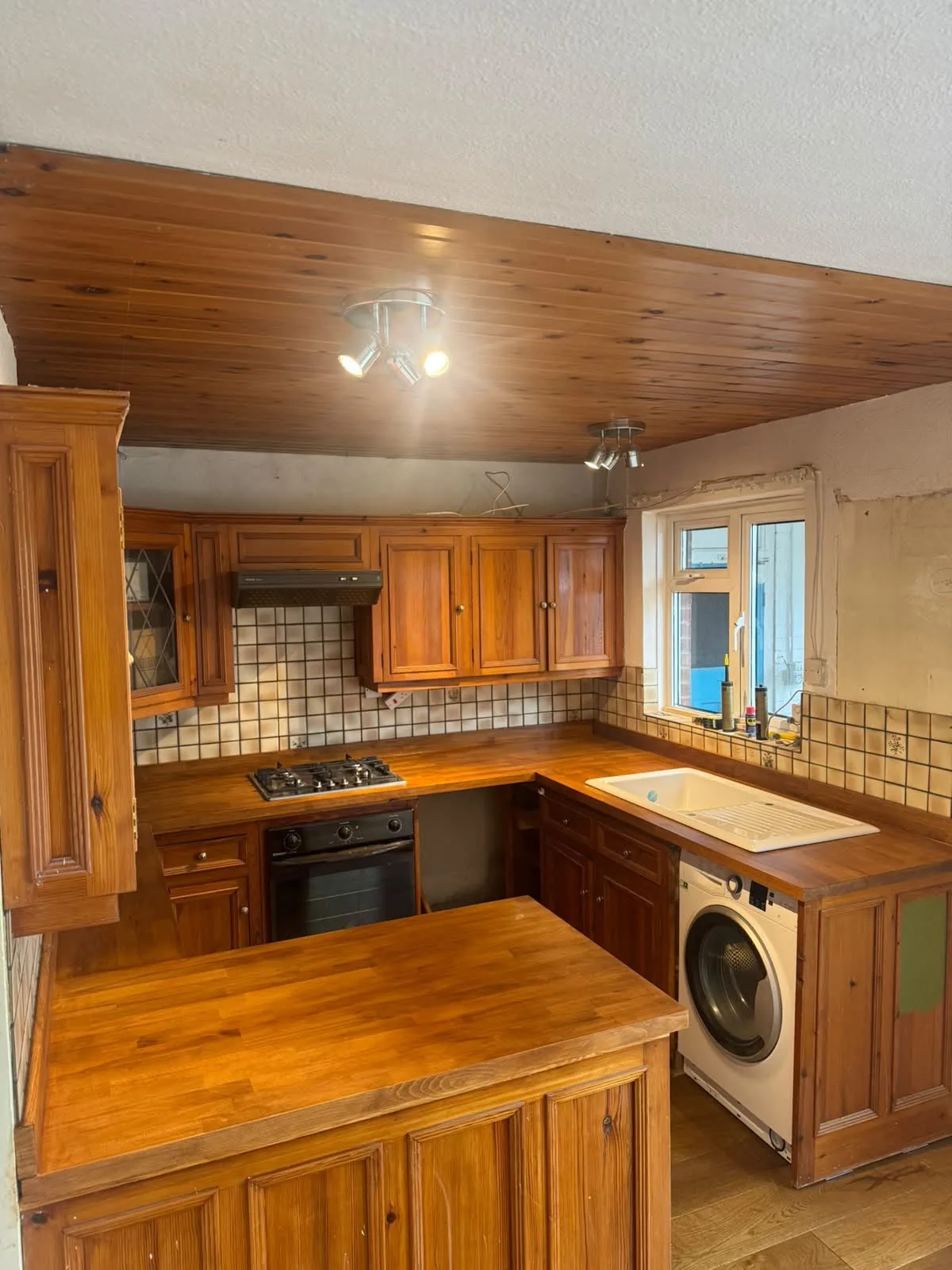 Kitchen plumbing installation and sink area completed by Infinite Plumbing & Heating